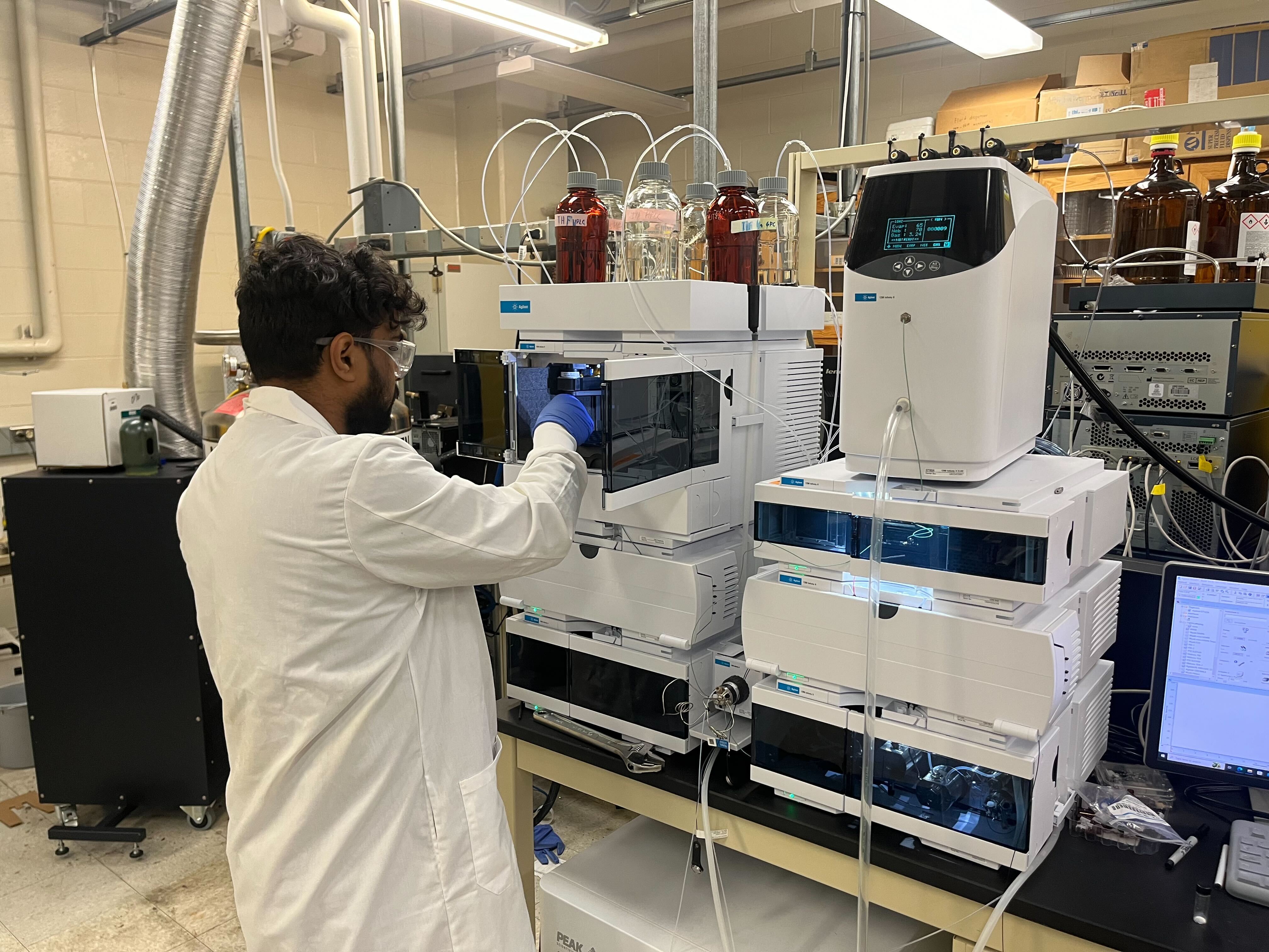 Researcher in lab synthesizing CCSPs